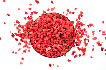 Freeze Dried Cranberry Pieces. Premium Freeze-Dried Fruit. Dried Cranberry on white background top view. Sweet dehydrated fruits. Cranberry Pattern. Cranberry Texture. red food texture.