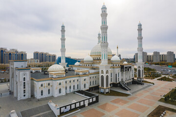 Fototapeta na wymiar October 15, 2022 Astana, Republic of Kazakhstan: Landmark of the city Nur-Astana Mosque aerial shot from a drone