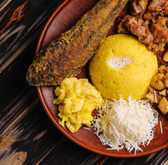 Traditional Moldavian hominy porridge on a wooden tray