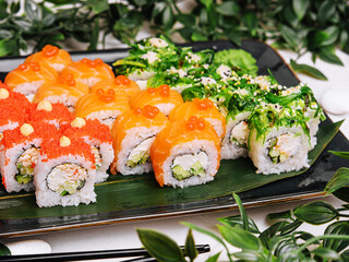 Big set of rolls with wasabi and pickled ginger