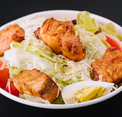 Caesar salad with chicken fillet and parmesan cheese
