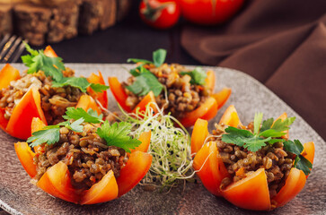 Tasty red stuffed tomatoes with rice and minced meat