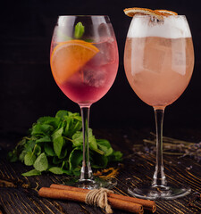 different drinks with alcohol on wood