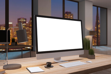 Close up of designer office desktop with empty white computer monitor, window with night city view, decorative items and supplies. Mock up, 3D Rendering.