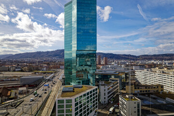Prime Tower skyscraper at industrial district of City of Zürich on a blue cloudy winter noon....