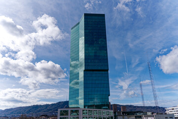Prime Tower skyscraper at industrial district of City of Z&uuml;rich on a blue cloudy winter noon. Photo taken March 9th, 2023, Zurich, Switzerland.