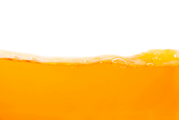 orange juice splash in glass