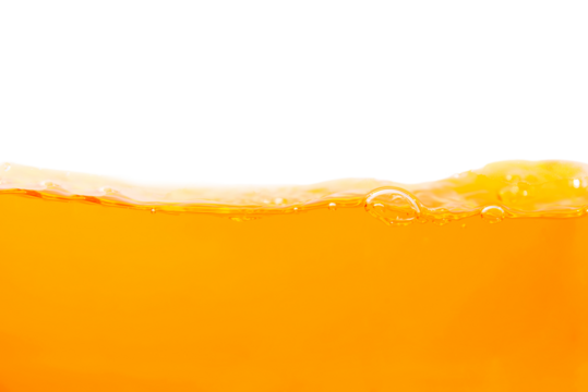 orange juice splash in glass