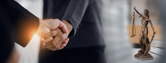 Business people shaking hands and contract agreement, law and justice concept, Selective focus.