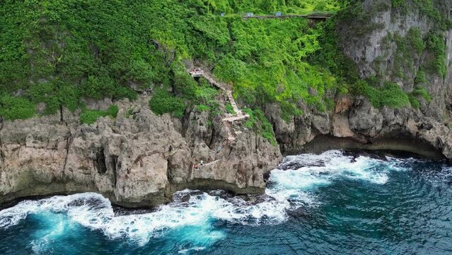 Breathtaking Sight Of Oka Point Cliff Nearby The Island In Tamuning, Guam, United States. aerial, zoom