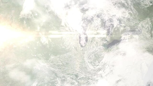 Earth zoom in from outer space to city. Zooming on Crystal Lake, Illinois, USA. The animation continues by zoom out through clouds and atmosphere into space. Images from NASA