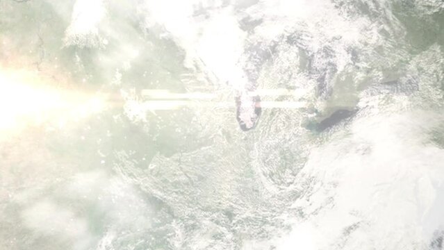 Earth zoom in from outer space to city. Zooming on DeKalb, Illinois, USA. The animation continues by zoom out through clouds and atmosphere into space. Images from NASA