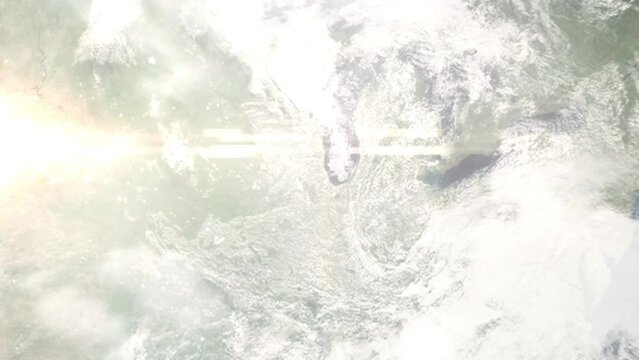 Earth zoom in from outer space to city. Zooming on Downers Grove, Illinois, USA. The animation continues by zoom out through clouds and atmosphere into space. Images from NASA