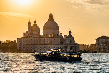 Fototapeta na wymiar Venice canal at sunset in Italy