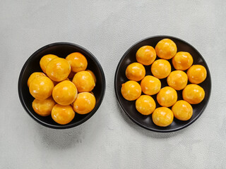 Nastar, Nastar Cookies or Pineapple tarts are small, bite-size tart filled with pineapple jam. Indonesian cookies popular during Eid Mubarak.