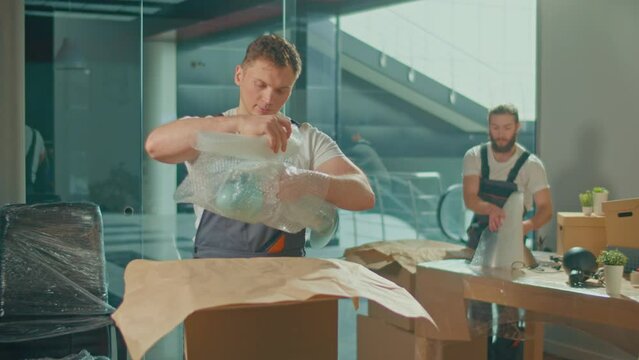 Professional Packing and Unpacking Services. Packing and Preparation for Moving. Shipping and Packaging Business Occupation Service Company. Preparation for a Long Trip, Transportation of Things.