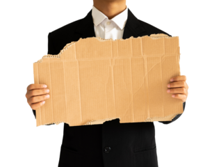 Business man wear suit and holding ripped cardboard for text mockups