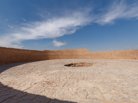 Low-angle view of the rooftop of the Zoroastrian Tower of Silence (Dakhma) in Yazd Province, Iran