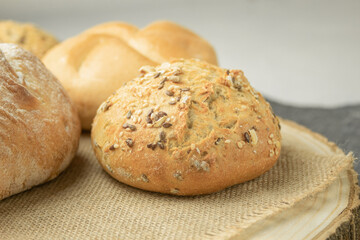 Fresh and crispy bread dissolves on the towel