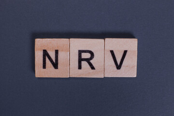 NRV Net realizable value from wooden letters on a gray background