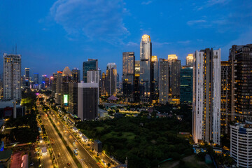 Obraz premium aerial photos of Sudirman street and Jakarta Skyline in the golden hour. 