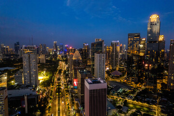 Obraz premium aerial photos of Sudirman street and Jakarta Skyline in the golden hour. 