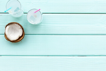 Coconut fresh milk cocktail in glasses with half of coconut