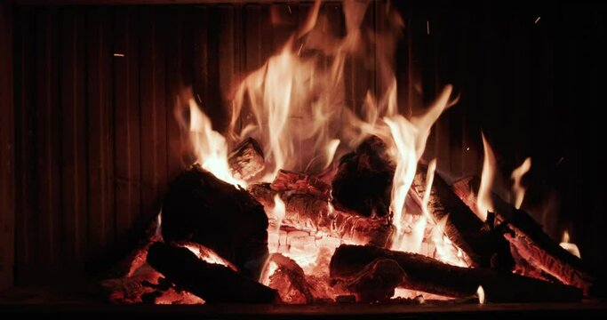 Fire burns in a modern fireplace