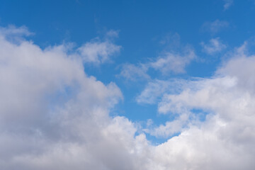 Clear blue sky and white clouds.Beautiful white cloud on clear blue sky as nature concept . Fresh air breeze