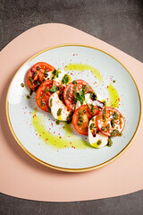 tomato with mozzarella and olive oil
