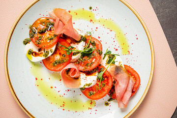 tomato with mozzarella and olive oil