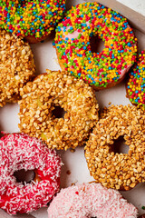 Sweet delicious glazed donuts in box,