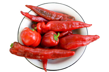 Red bell pepper, hot chili pepper, bell pepper, ratunda in a bowl. Large amount of red pepper in a...