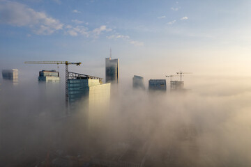 Aerial beautiful spring morning fog view of Vilnius business skyscraper downtown, Lithuania