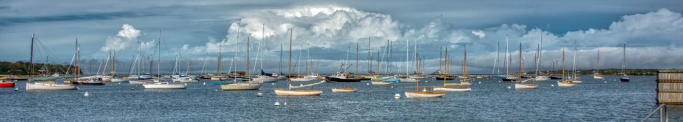 Fototapeta na wymiar Panoramic shot of boats in a harbor
