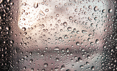 Drops on glass as an abstract background. Texture