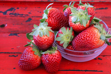 Strawberry and bluberries in a rustic red tray, fruits photography
