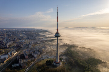Fototapeta premium Aerial beautiful spring morning fog view of Vilnius TV Tower Lithuania