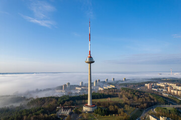 Aerial beautiful spring morning fog view of Vilnius TV Tower Lithuania