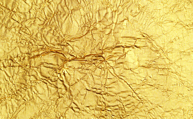 Gold shiny yellow texture abstract background.