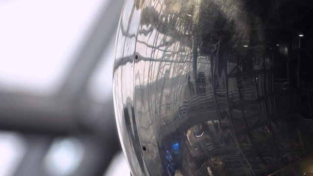 Orbital satellite. The first artificial earth satellite. Space technology concept. Close-up shot.