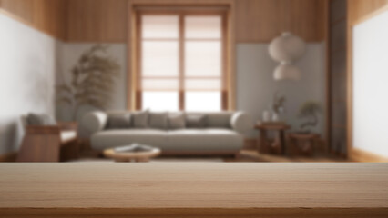 Empty wooden table, desk or shelf with blurred view of japandi wooden living room in minimal style. Fabric sofa with pillows, modern interior design concept