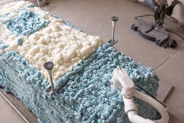 Large furnished bathroom in luxury home with tile floor, shower, bathtub, and view of master bedroom