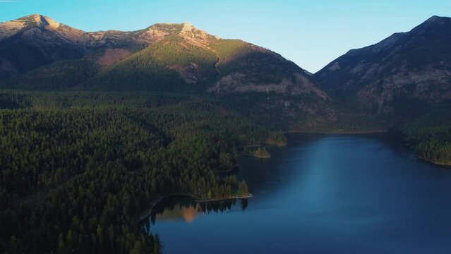 Picturesque Nature With Lush Forest And Mountains In Holland Lake, Missoula County, Montana, USA. Aerial Wide Shot