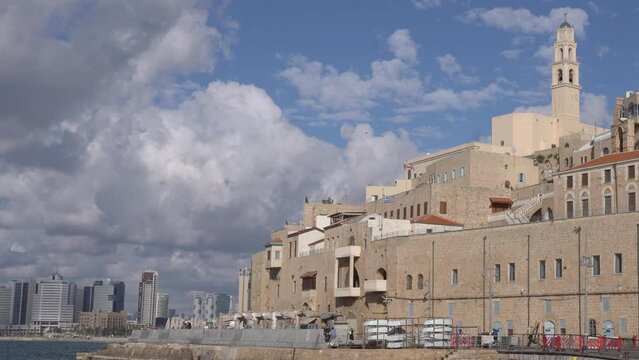 Iconic Bell Tower Of St. Peter's Church On The Mediterranean Coast In Jaffa, Tel Aviv-Yafo, Israel. wide