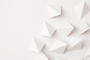 White triangle shapes on white background