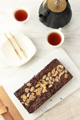 Chocolate Fudge Brownie with Chocolate Chips and Almond Slice Topping