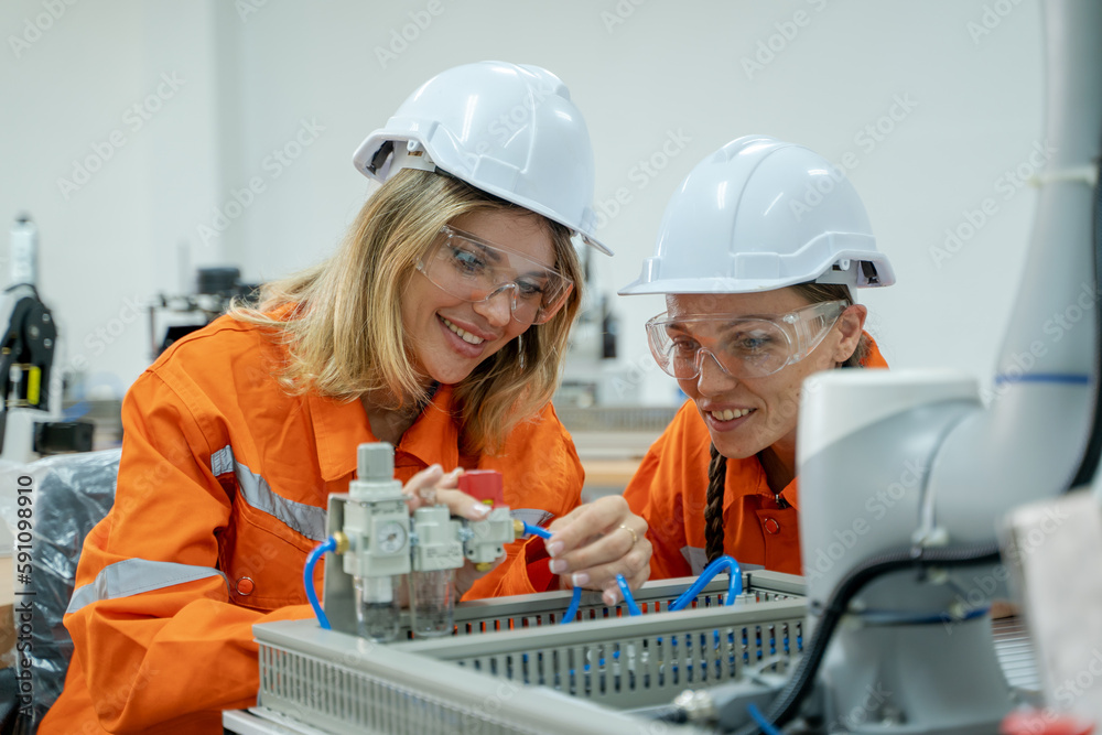 Fototapete engineer checking and operation robot arm at factory,technology, automation,innovation and engineeri