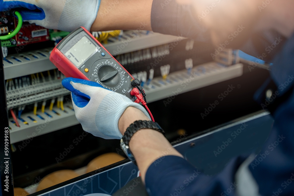 Aufkleber electrical engineers using measuring them with a multimeter test electrical installations and wiring