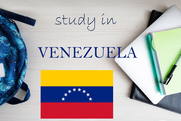 Study in Venezuela. Background with notepad, laptop and backpack. Education concept.